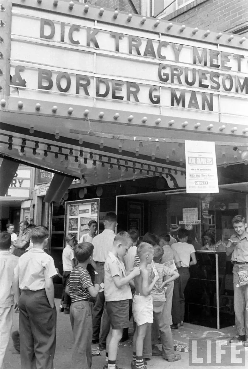 The Clark Theater in Grayson, Kentucky, 1948, with a crowd under the marquee